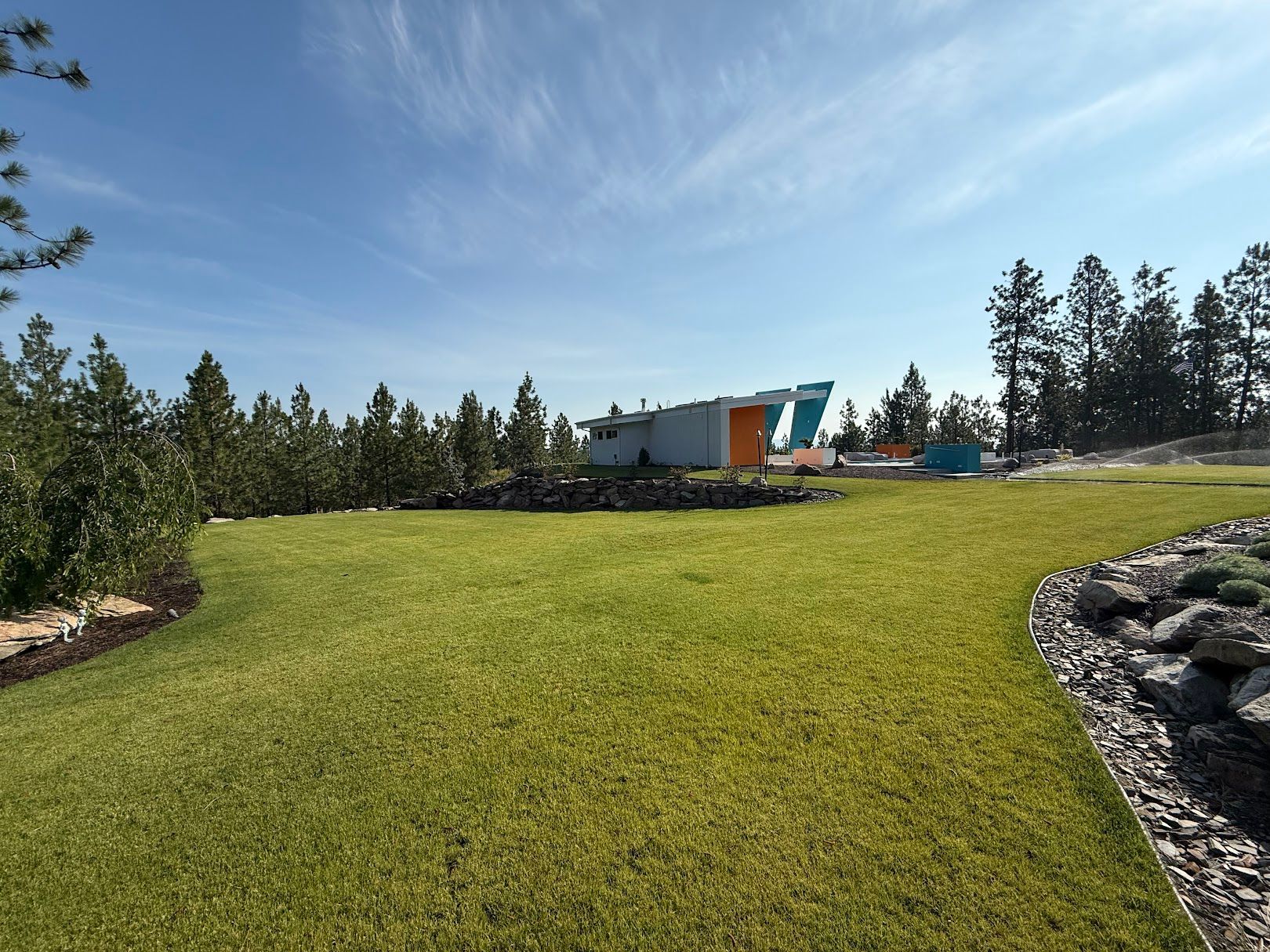 Same site finished with green lawn and landscaping