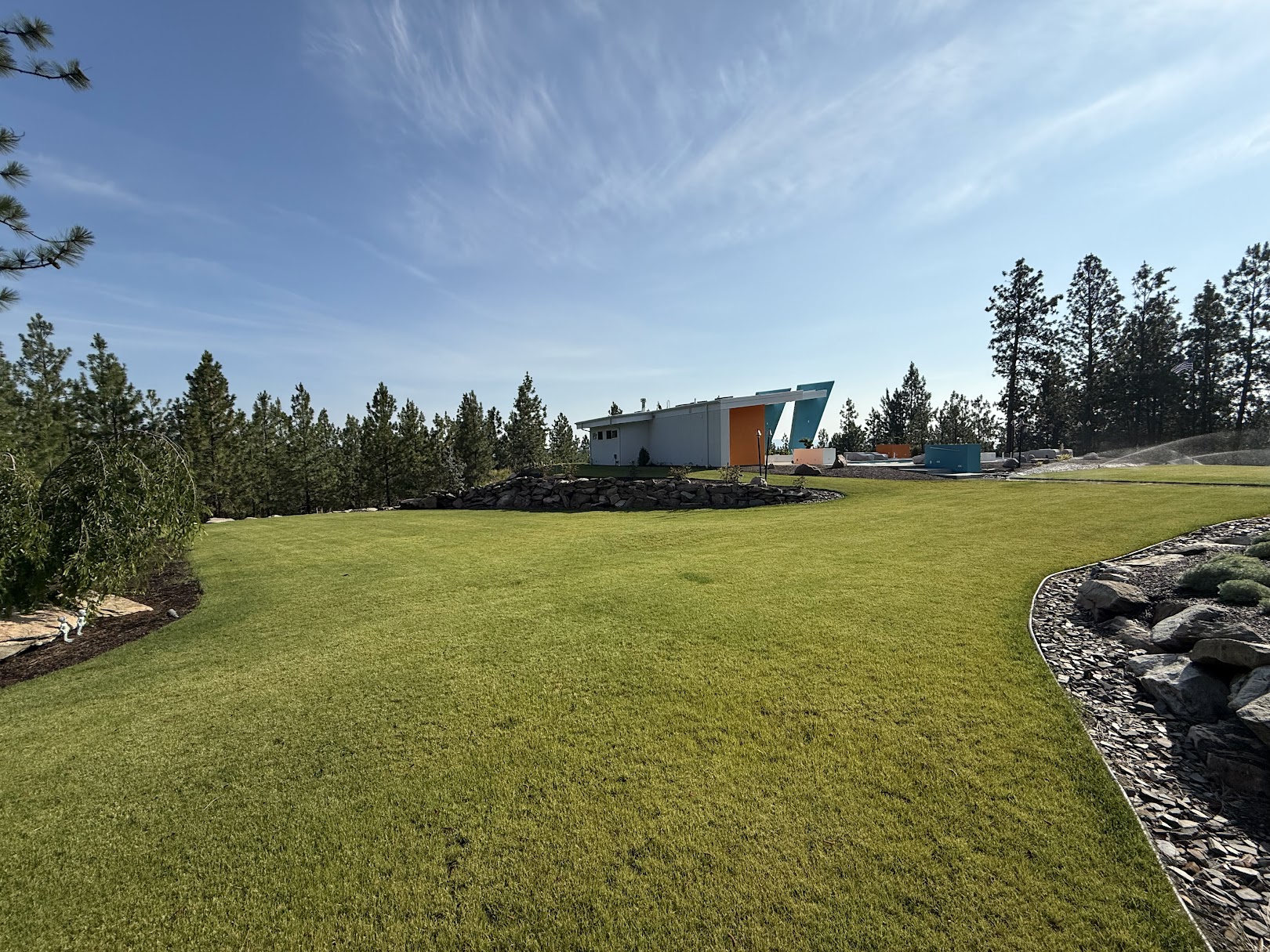 Same site finished with green lawn and landscaping